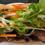 home made vietnamese banh mi sandwich with lemongrass pork
